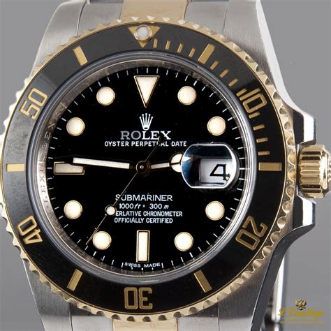 rolex submariner acero y oro.